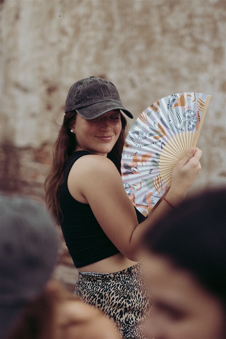 Juana with a fan